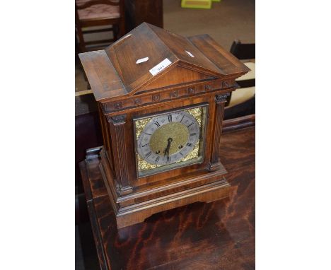 Late 19th/early 20th century Continental mantel clock in dark mahogany architectural case fitted with brass movement striking