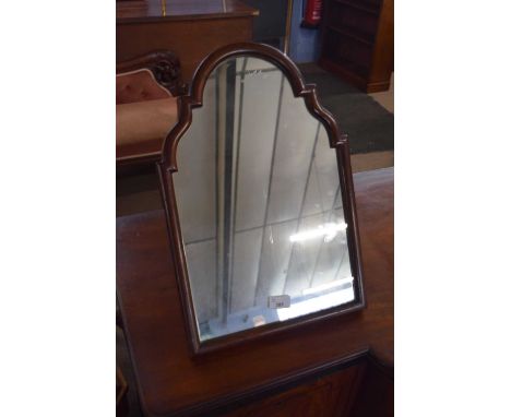 Early 20th century mahogany framed dressing table mirror of arched form fitted with an easel back, 49cm high