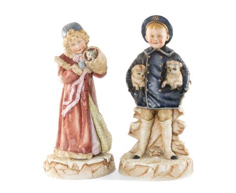 RARE PAIR OF GEBRÜDER HEUBACH BISQUE PORCELAIN FIGURES, from the Pet Series, 'Boy with Pugs' standing in a sailors suit a pug