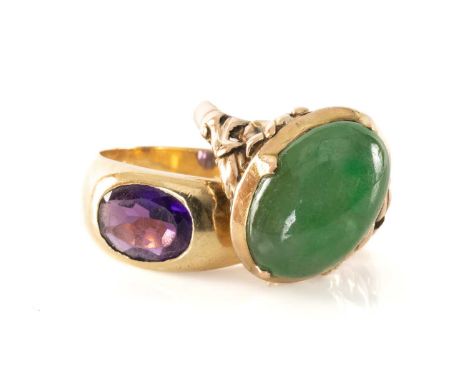 TWO GOLD RINGS, one set with oval cabochon jadeite in 14ct gold, the other with presumed amethyst in unmarked yellow metal, t