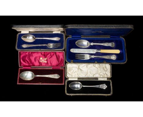 FOUR CASED SILVER CHRISTENING SETS, comprising knife and spoon set, knife, fork, and spoon set, and two teaspoons, variously 