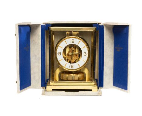 JAEGER LECOULTRE 'ATMOS' CLOCK, Classic V, brass dial with white chapter ring bearing Arabic numerals at quarters, skeleton s