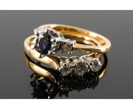 TWO 18CT GOLD RINGS comprising three stone diamond ring and a three stone sapphire and diamond ring, 5.3gms gross in ring box