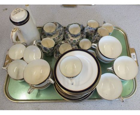 A Royal Worcester Bleu de Roi part tea and coffee set plus a Royal Doulton Nankin coffee set