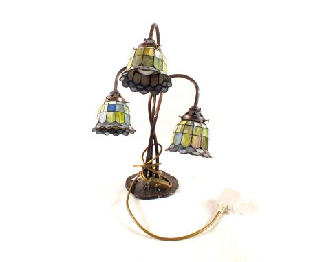 A Tiffany style three branch table lamp