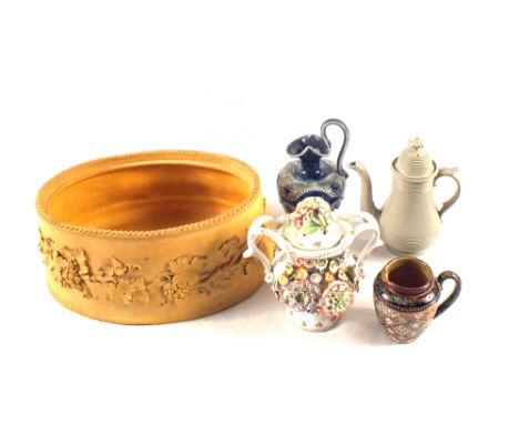 A 19th Century Wedgwood game dish, two Royal Doulton and one other stoneware item plus a floral encrusted covered jar