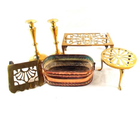 A pair of 19th Century Brass candlesticks, three trivets and a Copper planter