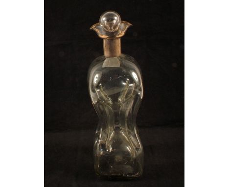 A Silver rim waisted decanter