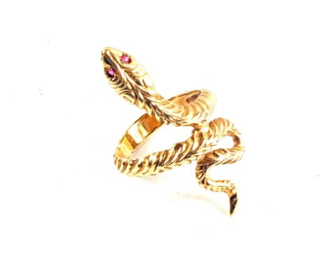 A 9ct Gold ring in the form of a snake with Ruby eyes, size N