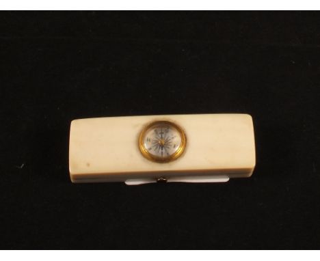 A 19th Century miniature Ivory travelling thermometer and compass