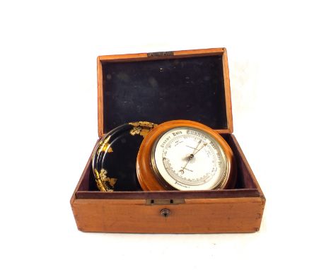 A Mahogany box containing circular aneroid barometer, lacquer and gilt tray etc