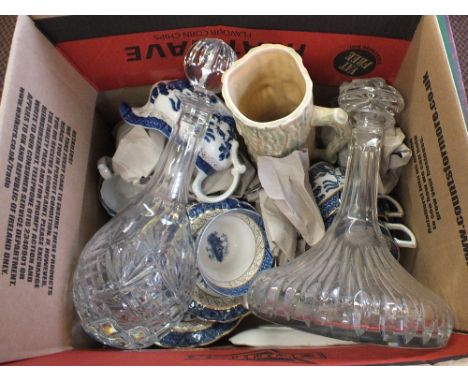 A cut glass decanter, blue and white plus other china