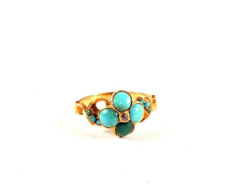 A Gold Turquoise and Diamond set ring (some of the Turquoise stones are discoloured), size K