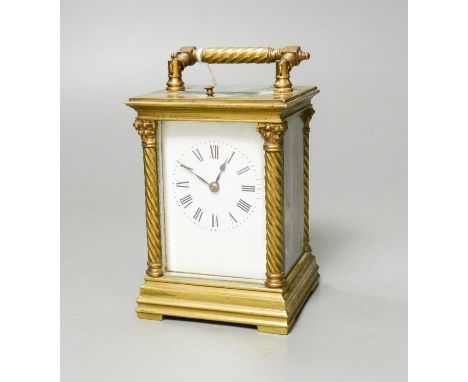   A French brass repeating carriage clock, c.1900, stamped R &amp;Co. Paris, 15.5 cm high handle up