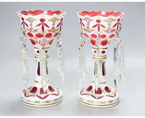   A pair of Bohemian style white and ruby overlaid glass table lustres, 20th century, 20.5 cm high