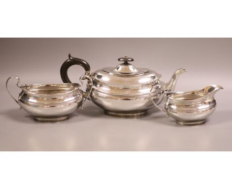   A George VI three-piece silver tea service, oval form, Sheffield 1939, Viner's Ltd, gross weight 35oz.