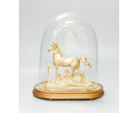   A Victorian gilt metal model of a horse with trophies of war to the base, under a glass dome, total height 30 cm