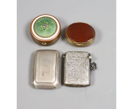   A George III silver curved snuff box, Birmingham, 1813, 52mm, a silver vesta case and two metal pill boxes