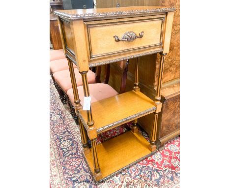   A late Victorian light oak whatnot, width 61cm, depth 35cm, height 122cm