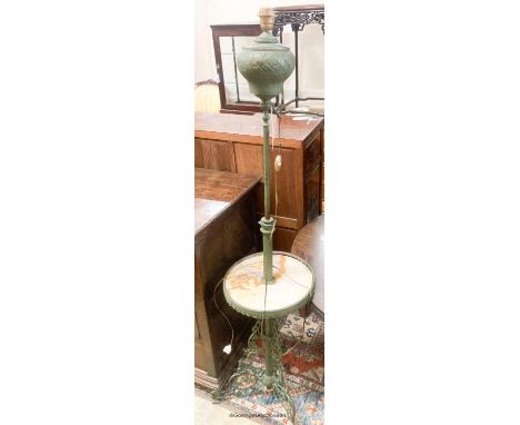   An early 20th century painted brass and onyx telescopic lamp standard, height 160cm