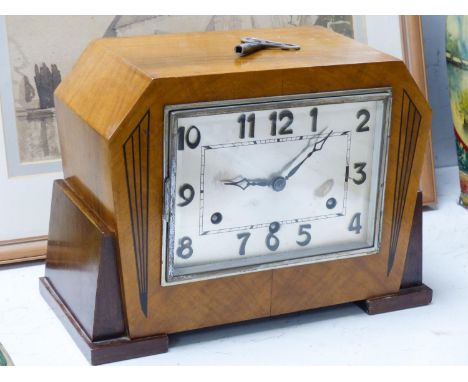   An Art Deco walnut cased eight day mantel clock, 32.5 cm wide