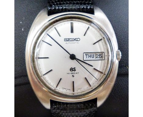   A gentleman's 1970's stainless steel Grand Seiko Hi-Beat chronometer day/date automatic wrist watch, on associated strap, m