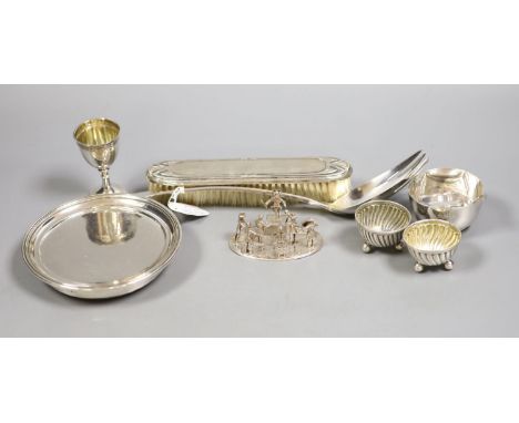   A small group of silver and white metal items including a William IV mounted coaster, London, 1830, 12.9cm, a small silver 