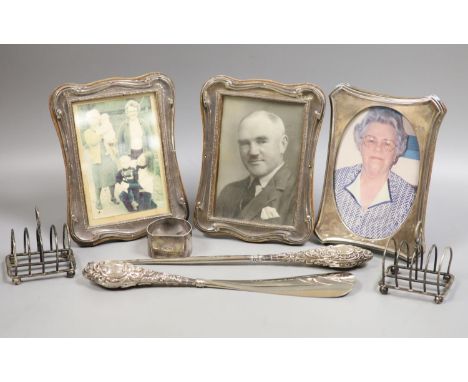   A pair of George V silver mounted photograph frames, Birmingham, 1915, 17.2cm, one other frame, a pair of small silver toas