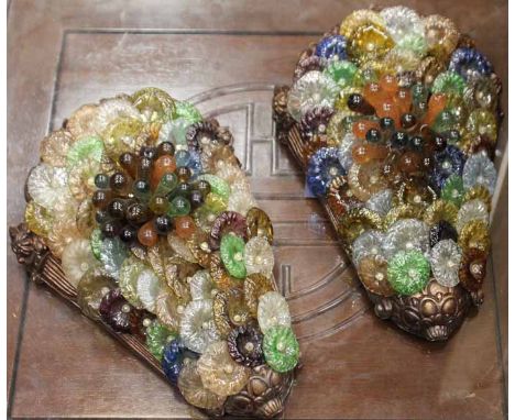 PAIR OF CAST METAL AND COLOURED GLASS WALL LIGHTS
of Art Deco design, decorated with stylised flowerheads and fruit, each 29c