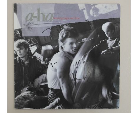 Aha LP "Hunting High & Low" signed to front cover Magne Furuholmen, Morten Harket & Paul Waaktaar-Savoy