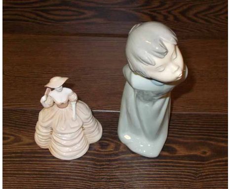 NAO FIGURE OF A BOY 
together with a Coalport figure of " Penny "