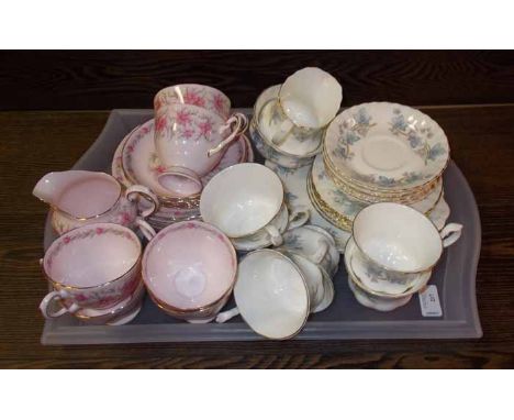 PINK FLORAL TUSCAN TEA SET
with six cups; together with a white floral pattern Royal Kent six cup tea service
Condition good,