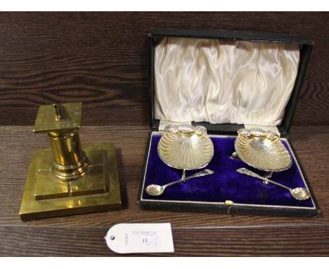 BRASS INKWELL IN THE FORM OF A SUNDIAL
along with a pair of scallop-shaped salts in a fitted case (2)