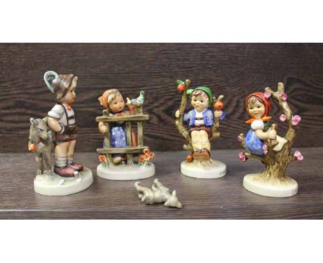 FOUR GOEBEL HUMMEL FIGURES
One damaged