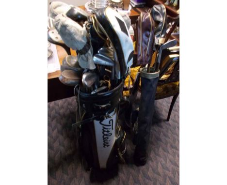 TWO SETS OF VINTAGE GOLF CLUBS
including wooden headed and shafted golf clubs