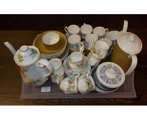 SUSIE COOPER MONOTONE COFFEE SET
in yellow ochre colour, complete; together with a grey post-modern styled Tuscan coffee set 