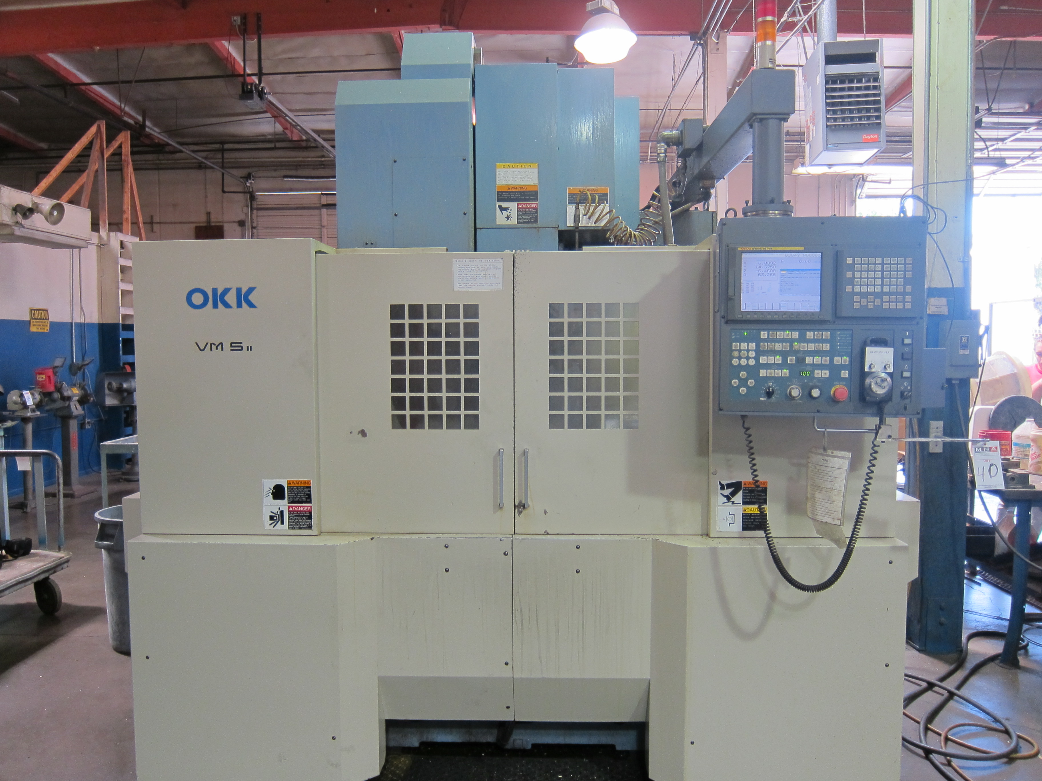 Lot 40 - OKK VM5 4 AXIS CNC VERTICAL MACHINING CENTER FANUC 16IM- CONTROLS 40