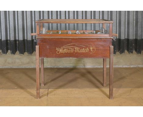 A 'Fußball-Match' game,mid-20th century and later, German, designed by Oskar Seipel, with a beech frame and a glass top, 127c