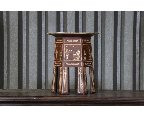 An Egyptian Revival inlaid wine table, early 20th century and later, decorated with bone, mother-of-pearl and various woods, 