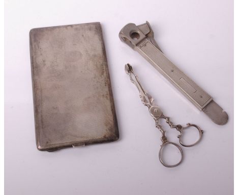 A silver cigarette cutter, engine turned, S J Rose &amp; Son, Birmingham, 1965, together with a silver cigarette case, engine