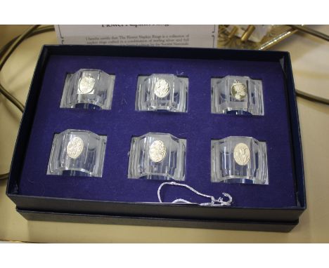 A part canteen Viners Dubarry stainless steel cutlery, boxed set 'Flower napkins rings' (sterling silver and crystal glass) b