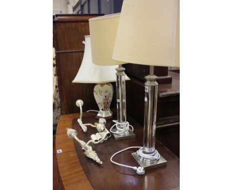 A pair of table lamps, clear perspex, another table lamp and a pair of twin light wall brackets, sold as parts