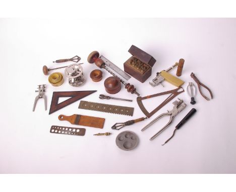 A collecton of watch/clock parts, tools and related in three boxes 
