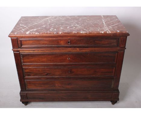 A 19th century Continental marble topped four drawer commode 101cm high, 120cm wide 