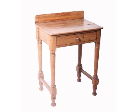 A 19th century light walnut side table with single drawer, turned legs and short upstand 56cm wide