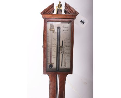 A late George III inlaid mahogany stick barometer, Tarone, circa 1800, with architectural pediment and brass urn final above 