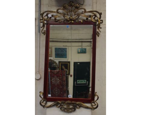 An Art Nouveau style wall mirror with floral gilt cresting  115 x 67cm 