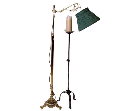 A brass Victorian style standard lamp and a 17th century style floor standing pricket stick on a tripod base, sold as parts