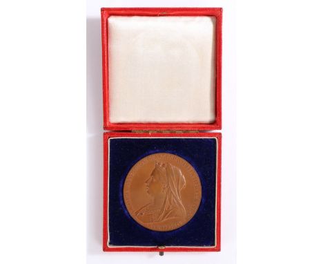 Queen Victoria diamond jubilee 1887 commemorative bronze medallion, with profile busts of the young and old Queen , housed in