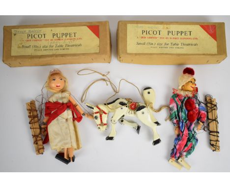 Three vintage marionette puppets comprising two Picot in original boxes and a Moco Junior Muffin the Mule (rear leg to this p
